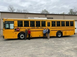 Calhoun County Schools taking delivery of a GreenPower BEAST all-electric purpose-built school bus. In the photo are Kelli Whytsell, Superintendent; Jenna Jett, Board of Education President; Michael Fitzwater, Assistant Superintendent and GreenPower Motor Vice President Mark Nestlen